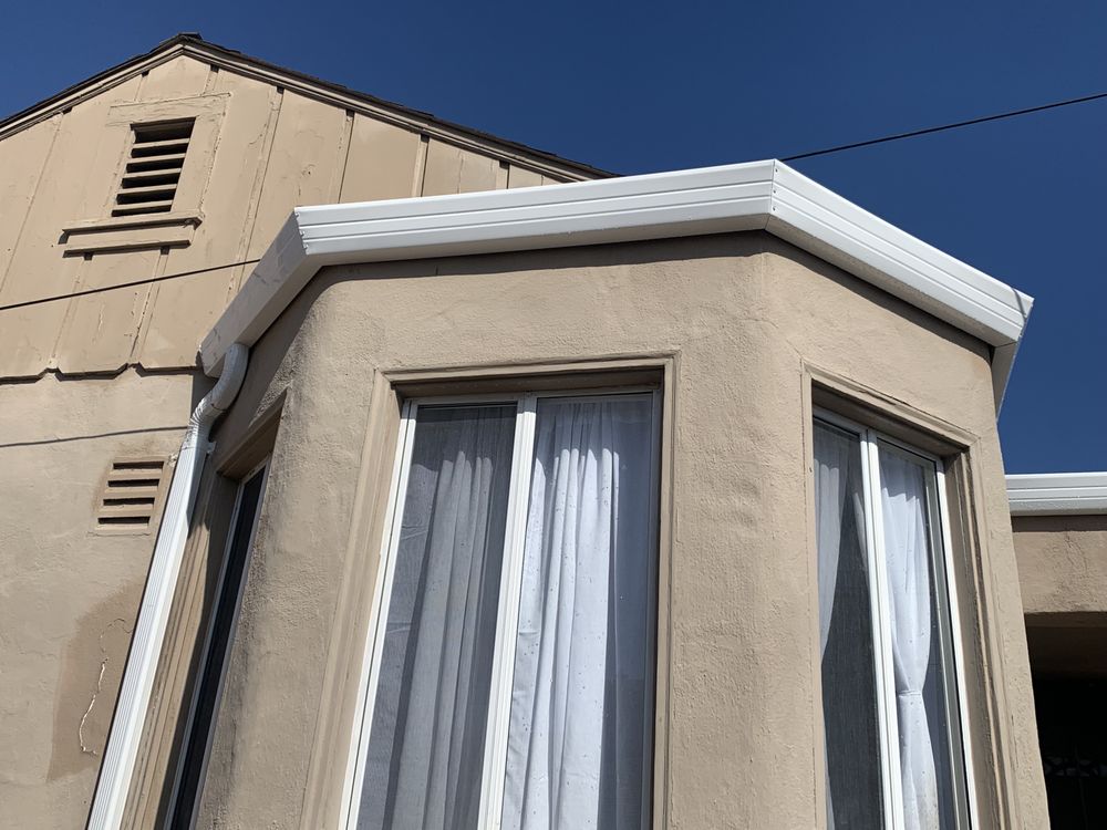 Slide of ML Gutters & Roofing