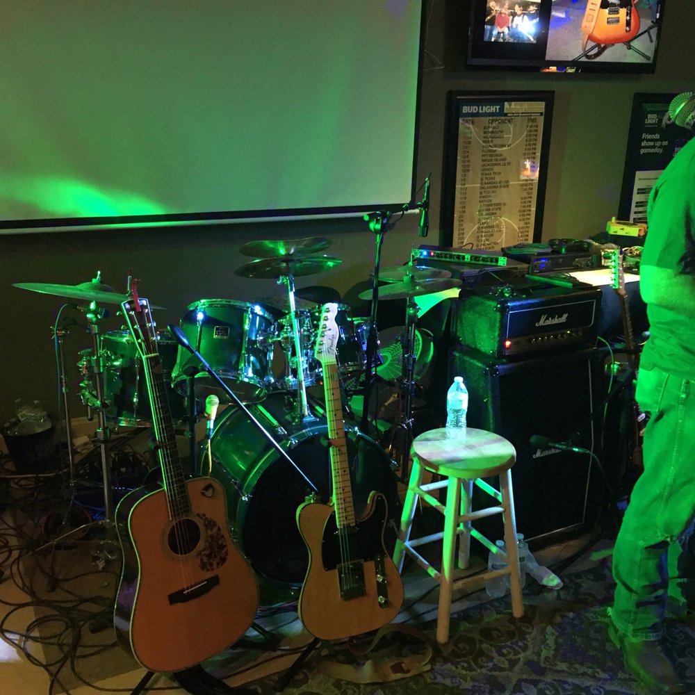 Vip Lounge - a man playing guitar and a woman singing - Pubs Near Me - Martinsburg, West Virginia Vip Lounge - a man playing guitar and a woman singing - Pubs Near Me - Martinsburg, West Virginia