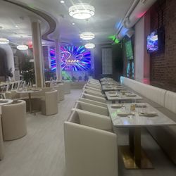Romana European Tapas Lounge - Partial view of dining area. There are 2 bars.
