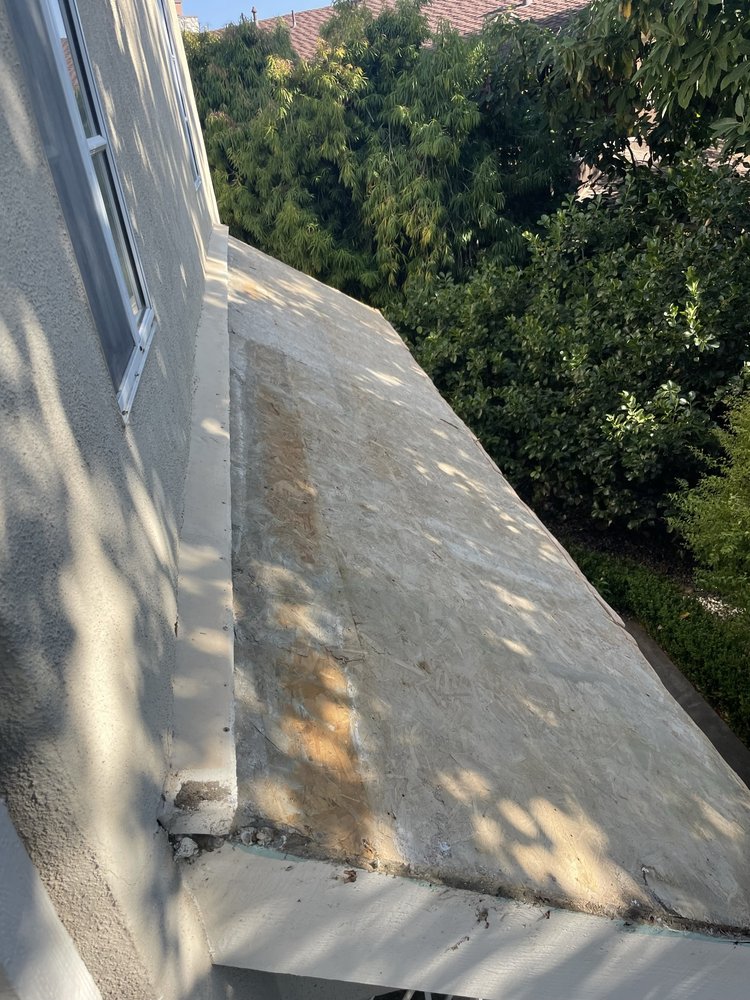 Slide of The Local Friendly Roofer