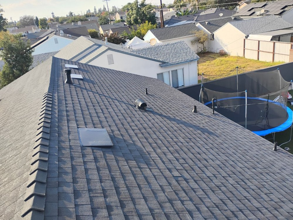 Slide of Sam's Roofing Co