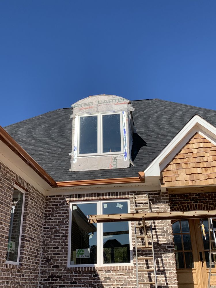 Slide of Brown's Roofing