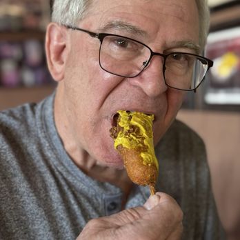 Dip Dog - Steve enjoying his delicious dip dog! - Fast Food Near Me - Marion, Virginia