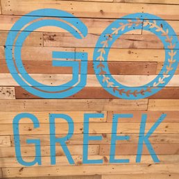 Greek-ish logo on wood. Greek-ish logo on wood.
