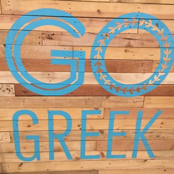 Go Greek - Greek-ish logo on wood. - Greek Near Me - Mineola, New York