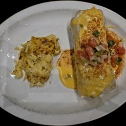 My burrito with a side of hash brown casserole My burrito with a side of hash brown casserole