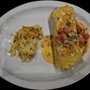 The Toasted Yolk Cafe - My burrito with a side of hash brown casserole - Breakfast & Brunch Near Me - Round Rock, Texas The Toasted Yolk Cafe - My burrito with a side of hash brown casserole - Breakfast & Brunch Near Me - Round Rock, Texas