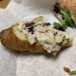 Au bon Pain - Maybe less than an oz of chicken salad on a croissant.