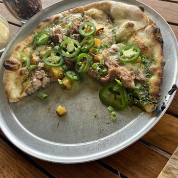 Monkeypod Kitchen by Merriman - Pizza with Kalua Pork, jalapeños and pineapple and Macnut pesto - New American Near Me - Kihei, Hawaii Monkeypod Kitchen by Merriman - Pizza with Kalua Pork, jalapeños and pineapple and Macnut pesto - New American Near Me - Kihei, Hawaii