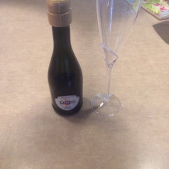 Weddings by the Falls - This is the ridiculous bottle of champagne we were given with these "gas station" complimentary champagne glasses. - Wedding Planning Near Me - Niagara Falls, New York Weddings by the Falls - This is the ridiculous bottle of champagne we were given with these "gas station" complimentary champagne glasses. - Wedding Planning Near Me - Niagara Falls, New York