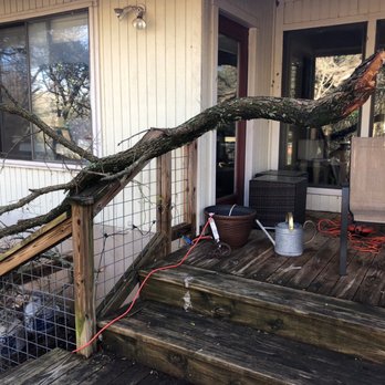 Four Seasons Landscape - a tree that has fallen on a porch - Tree Services Near Me - Spicewood, Texas Four Seasons Landscape - a tree that has fallen on a porch - Tree Services Near Me - Spicewood, Texas