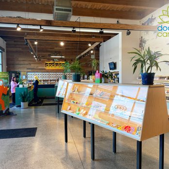Dockside Cannabis - SODO - An interior image of Dockside SODO's location with the Bigfoot mural you can take a photo in. There are several cannabis products on display - Cannabis Clinics Near Me - Seattle, Washington Dockside Cannabis - SODO - An interior image of Dockside SODO's location with the Bigfoot mural you can take a photo in. There are several cannabis products on display - Cannabis Clinics Near Me - Seattle, Washington