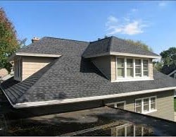 Slide of Space City Roofing