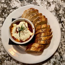 WiseGirl - Fire roasted baked goat cheese dip with seeded baguette