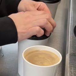 Cowgirl Barista - Bad hygiene. Hands touching lid where customers put their mouths