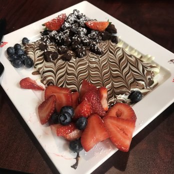 Chocolate Bash - Make your own dessert with your choice of bass and toppings. Crepe with Belgian chocolate,strawberries and blueberries, and brownie bits. - Desserts Near Me - Tustin, California Chocolate Bash - Make your own dessert with your choice of bass and toppings. Crepe with Belgian chocolate,strawberries and blueberries, and brownie bits. - Desserts Near Me - Tustin, California