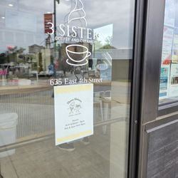 Three Sisters Coffee and Creamery - Front door and hours of operation.