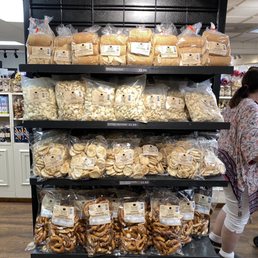 a woman shopping in a store a woman shopping in a store