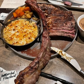 Black Walnut - Tomahawk Steak (sorry we already took a couple pieces). DELICIOUS!! - New American Near Me - Oklahoma City, Oklahoma Black Walnut - Tomahawk Steak (sorry we already took a couple pieces). DELICIOUS!! - New American Near Me - Oklahoma City, Oklahoma