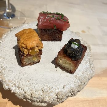 Cafe Miro - Brioche trio (this is just half of each piece, we asked them to cut it for us to share.) Uni, Caviar, and Ahi. Heaven! - Modern European Near Me - Honolulu, Hawaii Cafe Miro - Brioche trio (this is just half of each piece, we asked them to cut it for us to share.) Uni, Caviar, and Ahi. Heaven! - Modern European Near Me - Honolulu, Hawaii