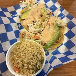 The fish tacos and rice, as served.