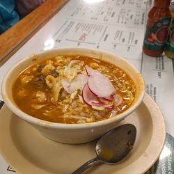 Soup vegetarian. Lacked flavour on it's own but better with squeezed lime and tortilla chips.