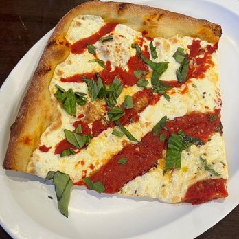 Genna Pizza - World's Largest Slice - Grandma - Pizza Near Me - Melbourne, Florida Genna Pizza - World's Largest Slice - Grandma - Pizza Near Me - Melbourne, Florida
