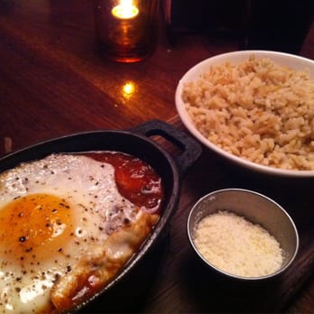 Nada - Tigna Poblana: chicken and chorizo spicy tomato rice and fried egg - Mexican Near Me - Cincinnati, Ohio Nada - Tigna Poblana: chicken and chorizo spicy tomato rice and fried egg - Mexican Near Me - Cincinnati, Ohio