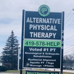 Alternative Physical Therapy - A large highly visible sign on Reynolds Road