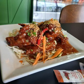 Love & Thai - Shad rhai, pork belly with bok choy and thai angel wings. All amazing - Thai Near Me - Fresno, California