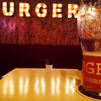 Big Al's - A quick look at the remnants of my craft beer (from Barcelona) and the glowing We "heart" Burgers sign. - American Near Me - Sitges, B