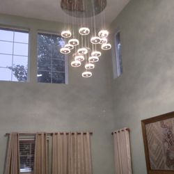 The Electric Company - Custom light fixture on high ceiling
