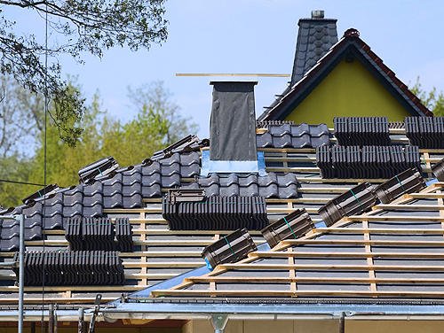 Slide of J & B Roofing Construction