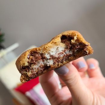 Craig's Cookies - a hand holding a half eaten cookie - Bakeries Near Me - Toronto, Ontario Craig's Cookies - a hand holding a half eaten cookie - Bakeries Near Me - Toronto, Ontario