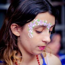 A New Twist Balloons and Face Painting - Flower face painting.