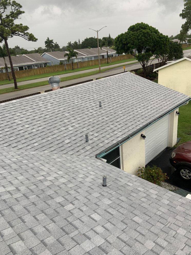 Slide of Louis Roofing