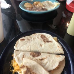 Breakfast tacos and Huevos Rancheros Plato Breakfast tacos and Huevos Rancheros Plato