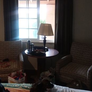 Hacienda Motel - The room with table, two chairs and light. - Hotels Near Me - Yuma, Arizona