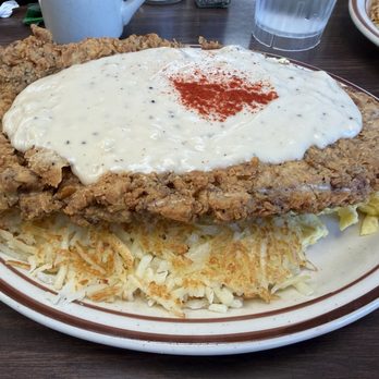 Vic's Daily Cafe - Massive chicken fried steak, can barely see the hash browns and scrambled eggs! - American Near Me - Albuquerque, New Mexico Vic's Daily Cafe - Massive chicken fried steak, can barely see the hash browns and scrambled eggs! - American Near Me - Albuquerque, New Mexico