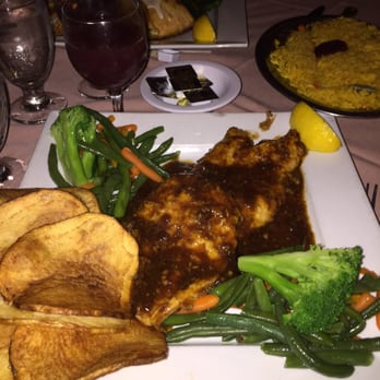 Malaga Restaurant - Garlic boneless chicken with vegetables rice and red sangria - Spanish Near Me - Hamilton Township, New Jersey