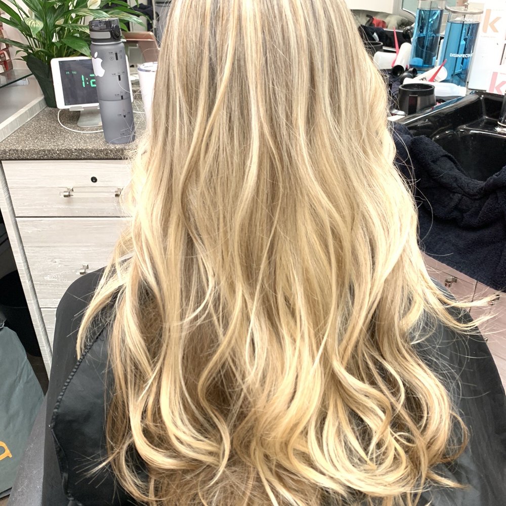 Partial highlights and trim with added long layers. Partial highlights and trim with added long layers.