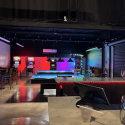 Roots - Arcade & pool area, pickleball outside to the left!!