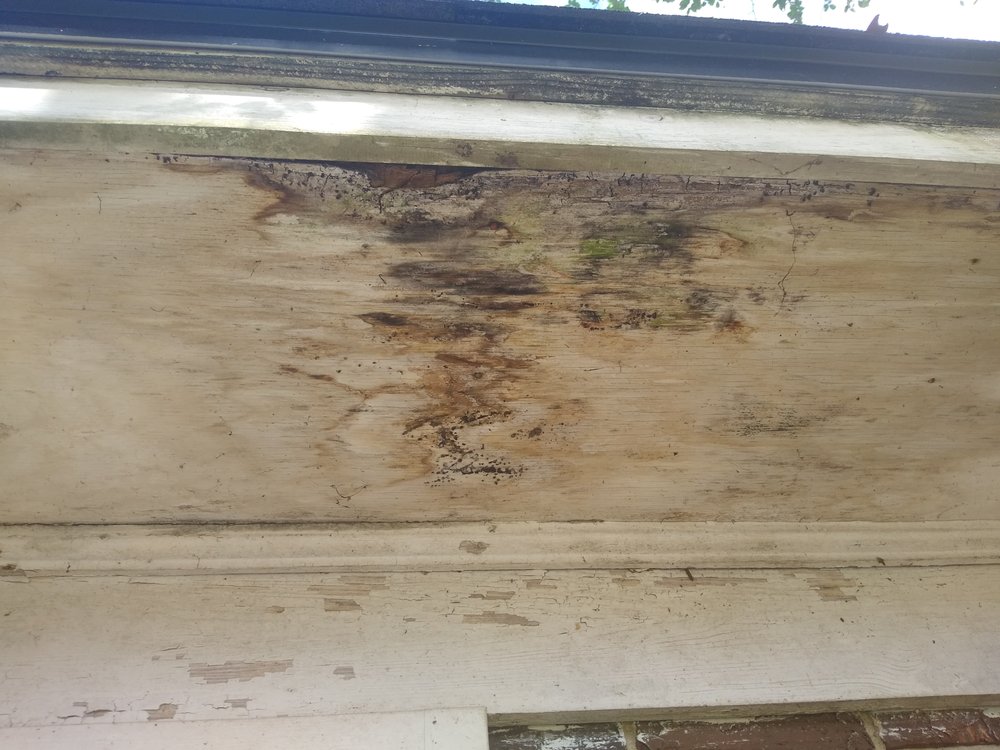 Slide of Tadlock Roofing