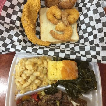 The Rolling Rooster - Overpriced Oxtails (w/o rice) w yummy greens and Mac & cheese. Added on side shrimp, fish and wing - Chicken Wings Near Me - Austin, Texas The Rolling Rooster - Overpriced Oxtails (w/o rice) w yummy greens and Mac & cheese. Added on side shrimp, fish and wing - Chicken Wings Near Me - Austin, Texas