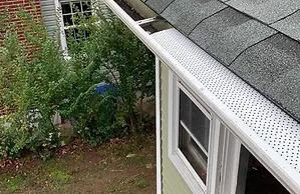 Slide of Green Leaf Roofing