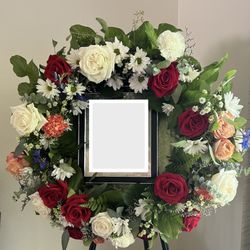Forever Flowers - The arrangement which then was able to be used (propped up on an easel) with a frame in the middle with a photo