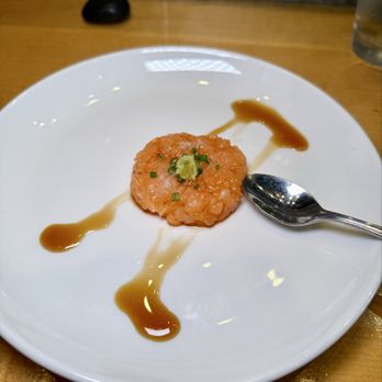 Umi - Salmon tartare with minced sweet onion and garlic, drizzled with yuzu, topped with wasabi, chive, and tsume - Japanese Near Me - Pittsburgh, Pennsylvania
