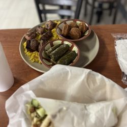 In & Out Kitchen - Falafel pita and lamb dinner with saffron rice, falafel and stuffed grape leaves