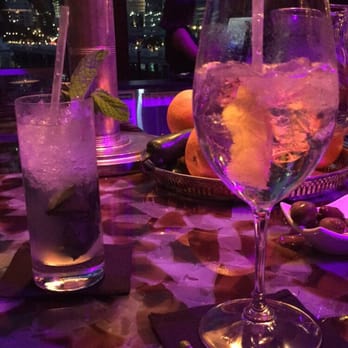 MO Bar + Lounge - Left: mojito; Right: Elderflower Spritz - Lounges Near Me - Miami, Florida MO Bar + Lounge - Left: mojito; Right: Elderflower Spritz - Lounges Near Me - Miami, Florida