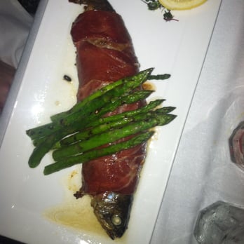 Hemenway's Restaurant - Parma Prosciutto wrapped whole trout. Yes, it is smiling. - Seafood Near Me - Providence, Rhode Island Hemenway's Restaurant - Parma Prosciutto wrapped whole trout. Yes, it is smiling. - Seafood Near Me - Providence, Rhode Island